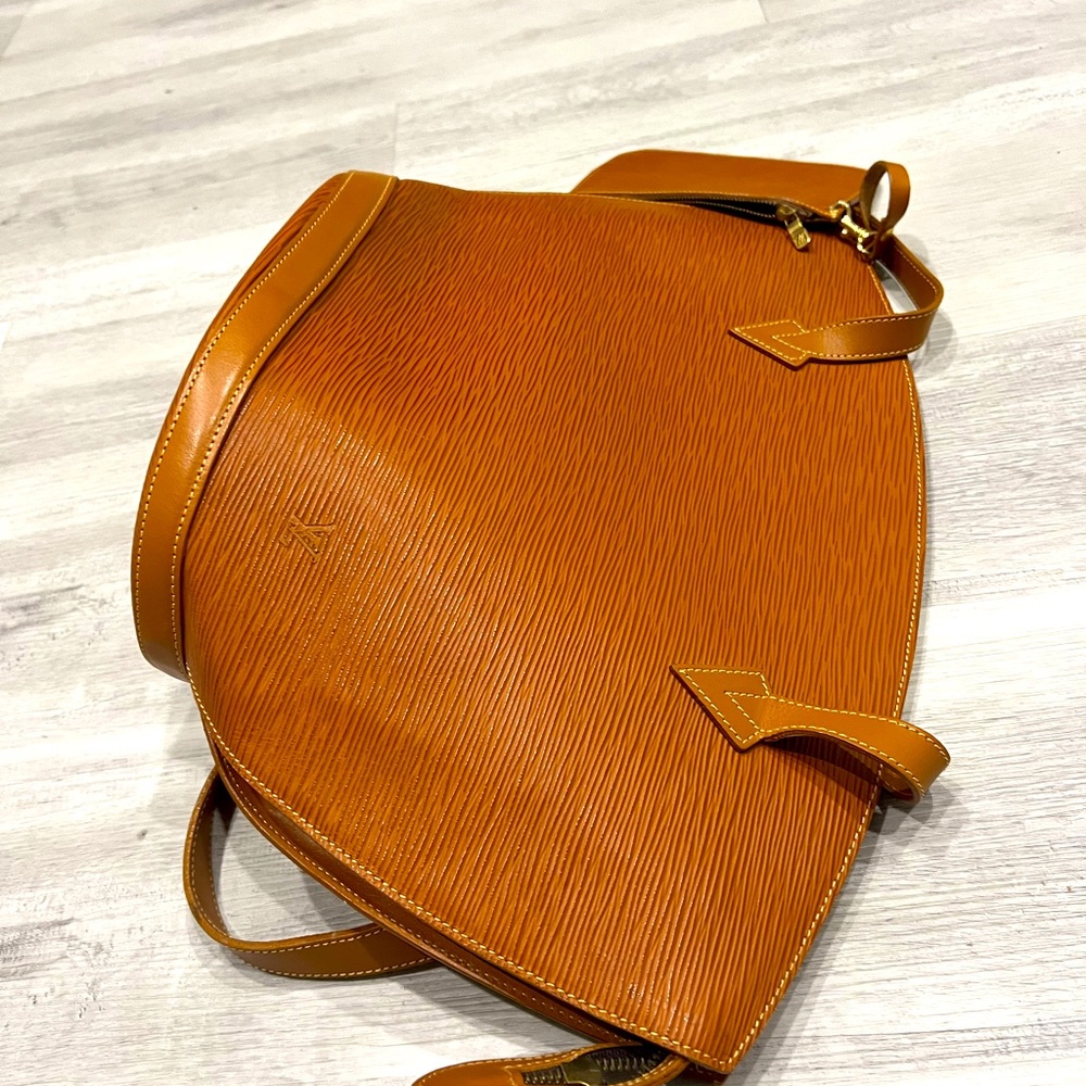 Authentic Louis Vuitton St. Cloud bag in a classic brown monogram canvas.